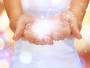 magic twinkles on female hands