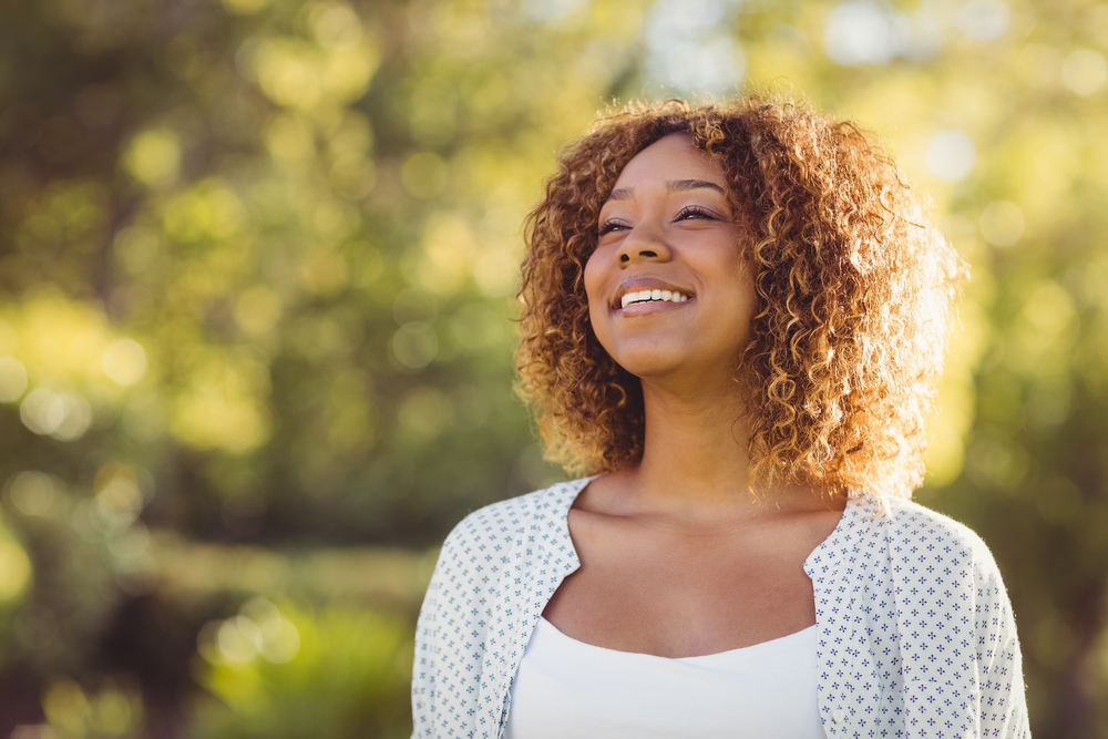 woman smiling on a sunny day