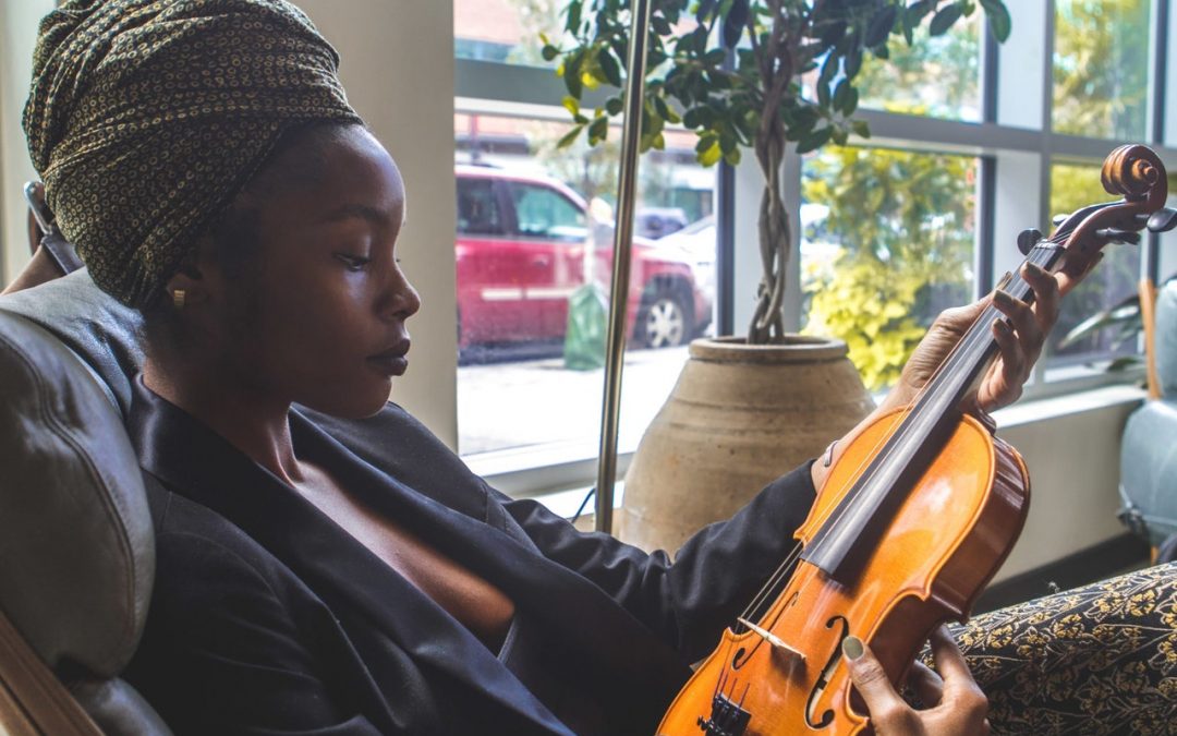 Woman holding a violin